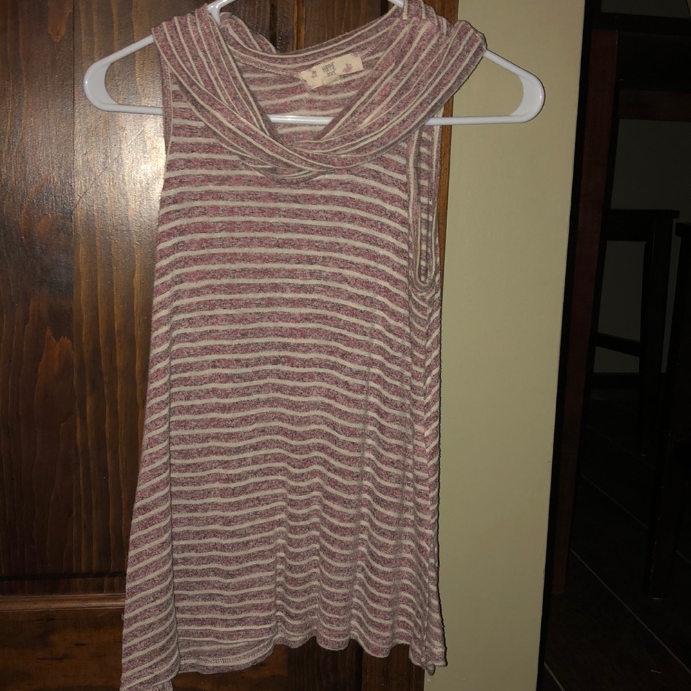 2 loose striped tanks